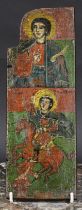 An Eastern orthodox panel or icon section, painted in polychrome with saints, inscribed to verso,