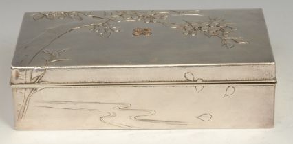 A Japanese silver rectangular cigar box, chased with blossoming prunus on a planished ground, hinged