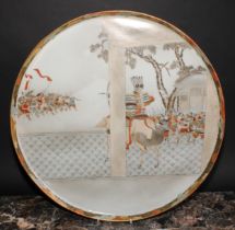 A Japanese Kutani circular tray, painted in gilt and polychrome with a battle scene, character