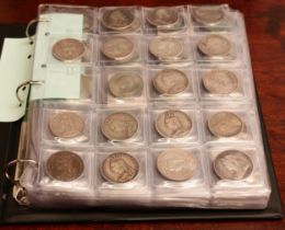 A collection of UK mainly silver coins – green ring binder album in slip case containing a selection