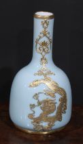 A Chinese celadon type mallet shaped vase, gilt metal mounted, with ferocious dragons and stylised