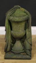 A carved stone draped urn, 58cm high, the base 30.5cm square