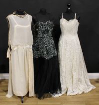 Vintage Fashion - a cream silk chiffon wedding dress, scalloped neckline, open sleeves, detailed