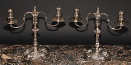 A pair of George III style silver two branch candelabra, Nayler Brothers, London 1959, 1,165g (2)
