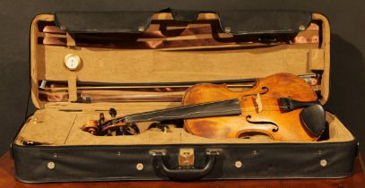 A violin, the two-piece back 35.5cm long excluding button, paper label printed Joseph Guarnerius,