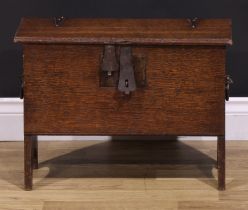 A 17th century style oak coffer bach or child’s six plank chest, hinged top with notched ends