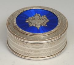 A French silver and enamel circular table snuff box, the push-fitting cover centred by a fasces on