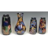 A Royal Stanley Ware Jacobean Tulip pattern terracotta tapering cylindrical vase, cobalt blue