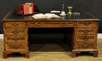 A George III Revival walnut and mahogany twin pedestal partners’ desk, rectangular top with inset