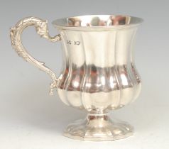 A William IV silver fluted campana wine cup, acanthus scroll handle, gilt interior, 10cm high,