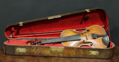 A violin, the two-piece back 35.75cm long excluding button, rosewood tuning pegs, outlined