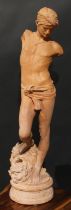 After the Antique, a terracotta figure, Young David, his foot on the head of Goliath, 89cm high