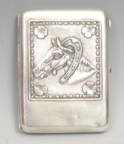 A Russian silver rounded rectangular cigarette case, the hinged cover chased with a horse, gilt