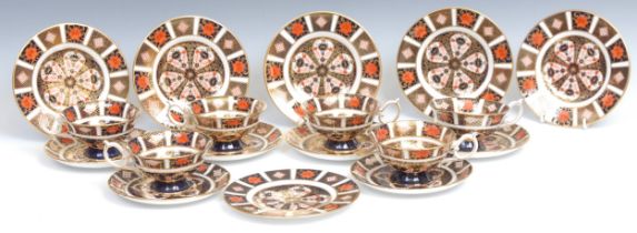 A set of six Royal Crown Derby Imari palette 1128 pattern teacups, saucers and tea plates, first