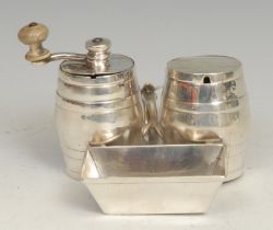 An unusual Victorian silver novelty condiment set, as coopered barrels and a trough, with integral