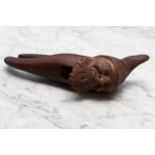 Nutcrackers - a Black Forest novelty lever-action nut cracker, carved as the head of a bearded