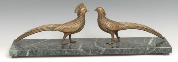 An Art Deco period group, cock and hen pheasants, marble base, 55cm wide