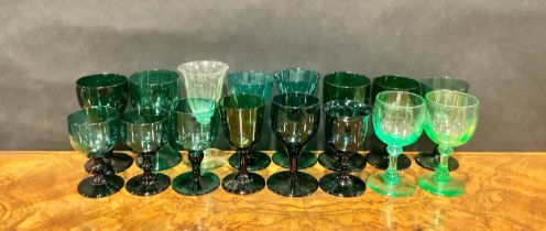 A pair of 19th century turquoise coloured drinking glasses, knopped stems, domed circular feet, 10cm
