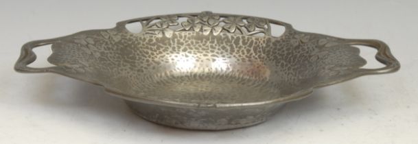 Liberty - a Tudric pewter Art Nouveau dish, design no.0287, embossed with clover on a planished