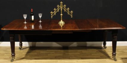 A 19th century mahogany extending dining table, in the manner of Gillows of Lancaster and London,