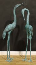 A pair of substantial contemporary verdigris patinated copper alloy garden models, as waterbirds,