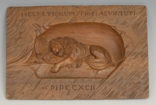 A Black Forest panel, carved after Bertel Thorvaldsen (1770 - 1844) with the Lion of Lucerne, 13cm x