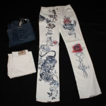 Vintage Fashion - a pair of Roberto Cavalli lady's white denim jeans, Amour, printed with trailing