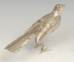 A Continental cast silver novelty table decoration, a model of a bird, 17cm long, marked to tail,