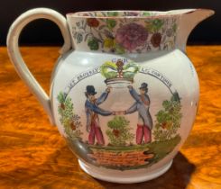 A George IV pottery jug, commemorating William of Orange, one side transfer-printed with a panel