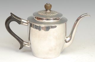 A late 18th century Russian silver teapot, quite plain, push-fitting cover applied with a leafy