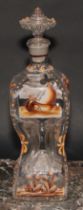 A 19th century Dutch glass pinched decanter, decorated in sepia enamel with landscapes, figures,