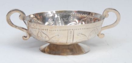 An early 18th century silver quaiche, marks rubbed, London hallmark, 11cm wide