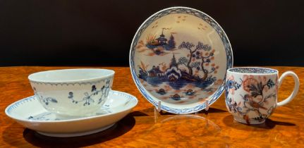 A Liverpool Birds in Branches pattern coffee cup, decorated in blue and red, picked out in gilt,