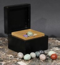 Geology - a collection of egg shaped polished stone and mineral samples, ebonised box