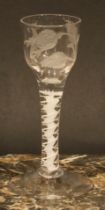 A George III opaque twist drinking glass, the bowl etched with fanciful bird and foliage, double-