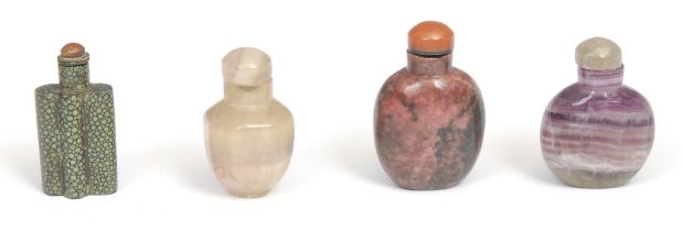 A Chinese polished amethyst snuff bottle, domed stopper, 6.5cm high; an octagonal quartz snuff