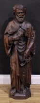 A North European oak ecclesiastical figure, carved as Saint Peter, holding the keys to heaven, 101cm