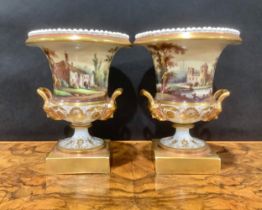 A pair of 19th century porcelain campana vases, each painted with Italianate views, beaded rim,