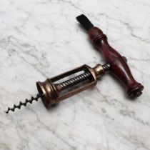 Helixophilia - a 19th century brass mechanical stirrup corkscrew, possibly Italian, turned