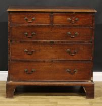 A George III mahogany chest, of two short and three long graduated drawers, brass swan neck handles,