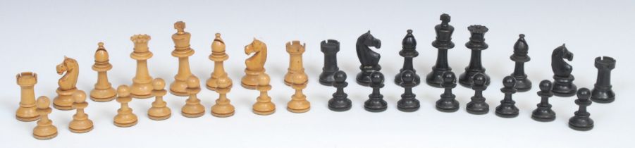 A boxwood and ebonised Staunton pattern chess set, weighted bases, the Kings 8cm high