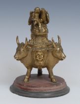 A 19th century Grand Tour bronze inkwell, cast after the Antique with bovine monopodia and Bacchic