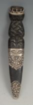 A Scottish silver mounted sgian dubh dagger, 8cm blade, the hilt and scabbard fittings carved and