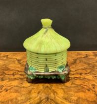 A Vallerysthal pressed glass novelty box and cover, as a beehive, 14cm high