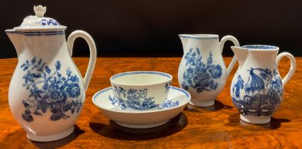 A Caughley Three Flowers pattern sparrow beak jug and cover, decorated in underglaze blue, flower