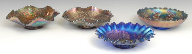 An American Northwood Carnival glass electric blue shaped circular bowl, moulded in low relief