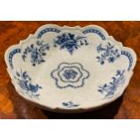 A Worcester shaped circular junket bowl, shell moulded, decorated in blue with flowers and