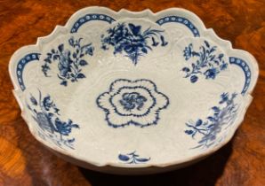 A Worcester shaped circular junket bowl, shell moulded, decorated in blue with flowers and