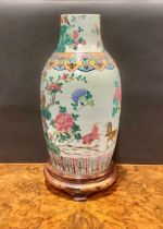 A Chinese ovoid vase, painted polychrome enamels in the famille verte palette with cockerels and