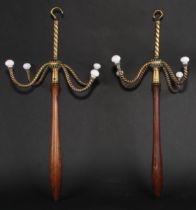 A pair of late Victorian brass and mahogany four-branch barrister’s wig and gown hangars, 54.5cm